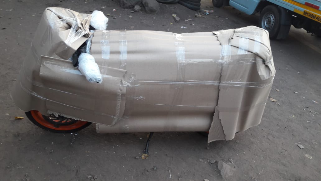 KTM Rc Bike Packing And Moving From Pune To Bagaluru, Using Material Like, Tharmacol, Airbubble, Foam Sheet, Brown Sheet, Lamination & Tape.