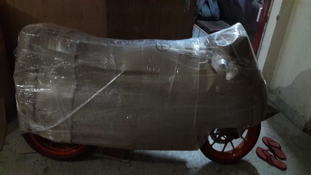 KTM Rc Bike Packing And Moving From Pune To Bagaluru, Using Material Like, Tharmacol, Airbubble, Foam Sheet, Brown Sheet, Lamination & Tape.